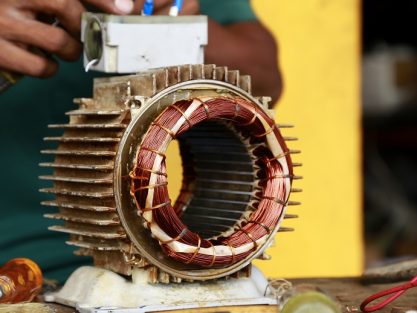 repairman during maintenance work of electric motors